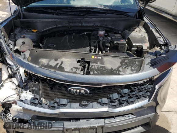2021 Kia Sorento LX z VIN 5XYRGDLC4MG018310, wystawiony jako Copart lot #56917725 z przebiegiem 42 665 mil mil oraz Szkoda całkowita • Salvage title. Historia ofert i sprzedaży dostępna na DreamBid. Obrazek 12.