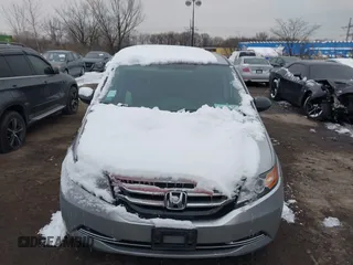 2014 Honda Odyssey LX with VIN 5FNRL5H22EB080346, listed as a IAAI auction lot 41282783 with 101,000 mi miles and . Bid and sale history available at carsss.com. Image 12.