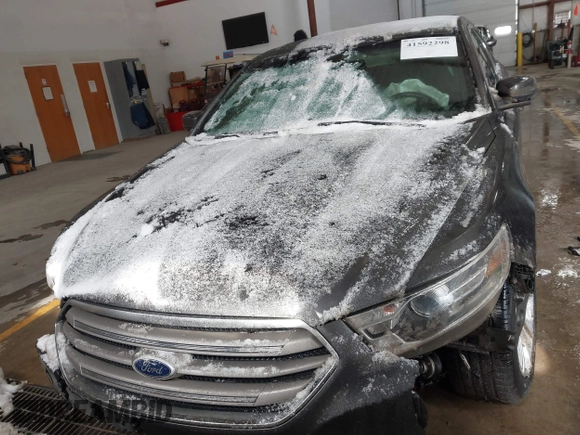 2015 Ford Taurus SEL with VIN 1FAHP2E89FG202589, listed as a IAAI auction lot 41592298 with 105,410 mi miles and . Bid and sale history available at carsss.com. Image 12.