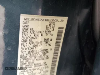 2006 Nissan Titan SE with VIN 1N6AA07B76N502666, listed as a Copart auction lot 56917515 with 118,877 mi miles and Salvage title. Bid and sale history available at DreamBid. Image 12.