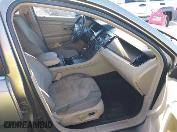 2013 Ford Taurus SEL with VIN 1FAHP2E91DG235771, listed as a IAAI auction lot 40210537 with 179,780 mi miles and . Bid and sale history available at carsss.com. Image 5.
