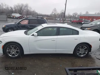 2015 Dodge Charger SXT with VIN 2C3CDXJG3FH746506, listed as a IAAI auction lot 41463713 with 130,687 mi miles. Bid and sale history available at carsss.com. Image 14.