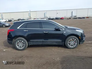 2019 Cadillac XT5 Luxury AWD with VIN 1GYKNDRS5KZ172975, listed as a IAAI auction lot 41814397 with 63,563 mi miles and . Bid and sale history available at carsss.com. Image 13.