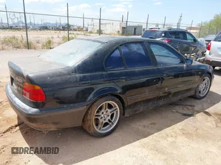 2000 BMW 5 Series 540i with VIN WBADN6348YGM67042, listed as a IAAI auction lot 42777403 with 163,701 mi miles and . Bid and sale history available at DreamBid. Image 4.
