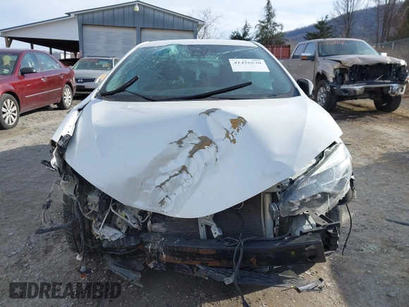 2017 Toyota Corolla L z VIN 5YFBURHE5HP633791, wystawiony jako IAAI lot #41426630 z przebiegiem 99 450 mil mil oraz . Historia ofert i sprzedaży dostępna na DreamBid. Obrazek 13.