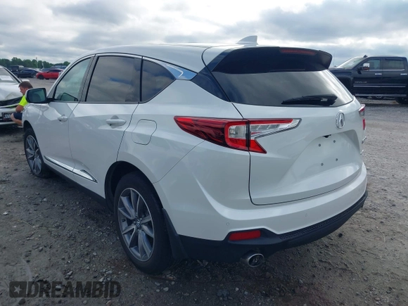 2020 Acura RDX Advance with VIN 5J8TC2H79LL033018, listed as a IAAI auction lot 42331295 with 53,015 mi miles and . Bid and sale history available at DreamBid. Image 3.