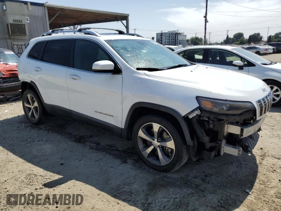 2020 Jeep Cherokee Limited with VIN 1C4PJLDX7LD521914, listed as a Copart auction lot 60939685 with 67,134 mi miles and Salvage title. Bid and sale history available at DreamBid. Image 4.