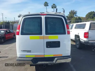2014 Chevrolet Express Cargo Van with VIN 1GCWGFCB2E1122236, listed as a IAAI auction lot 41381131 with 70,696 mi miles. Bid and sale history available at carsss.com. Image 16.