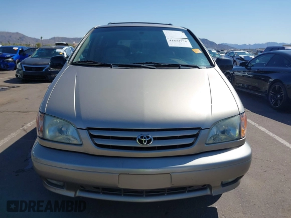 2002 Toyota Sienna LE with VIN 4T3ZF13CX2U500604, listed as a IAAI auction lot 41834778 with 139,668 mi miles. Bid and sale history available at carsss.com. Image 12.