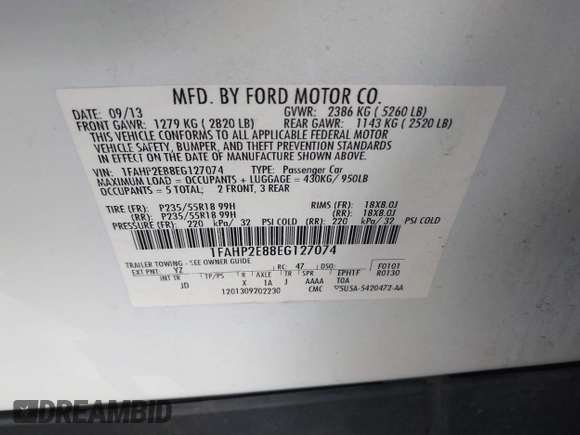 2014 Ford Taurus SEL with VIN 1FAHP2E88EG127074, listed as a IAAI auction lot 41688975 with 186,650 mi miles. Bid and sale history available at carsss.com. Image 9.
