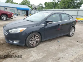 2017 Ford Focus Titanium with VIN 1FADP3J23HL218867, listed as a Copart auction lot 55417305 with 98,710 mi miles and Salvage title. Bid and sale history available at DreamBid. Image 1.