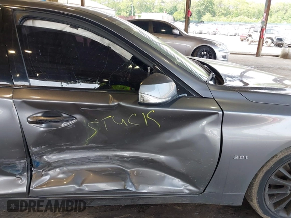 2019 Infiniti Q50 Luxe z VIN JN1EV7AR8KM594171, wystawiony jako IAAI lot #42428037 z przebiegiem 70 086 mil mil oraz . Historia ofert i sprzedaży dostępna na DreamBid. Obrazek 6.