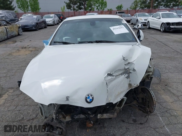 2011 BMW 3 Series 335i with VIN WBADX7C50BE579944, listed as a IAAI auction lot 42111612 with Not Provided miles and . Bid and sale history available at carsss.com. Image 12.