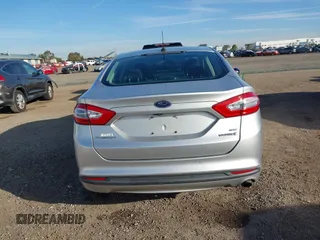 2014 Ford Fusion SE Hybrid with VIN 3FA6P0LU4ER206343, listed as a IAAI auction lot 41600260 with 198,834 mi miles and . Bid and sale history available at DreamBid. Image 16.