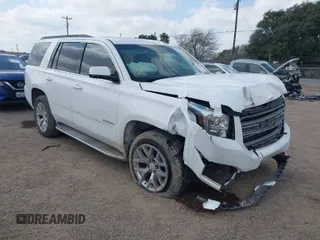 2015 GMC Yukon SLT with VIN 1GKS1BKC6FR109970, listed as a IAAI auction lot 41507467 with 115,309 mi miles. Bid and sale history available at carsss.com. Image 1.