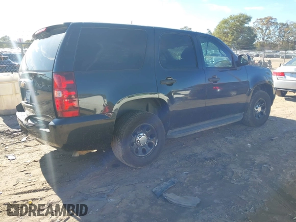 2013 Chevrolet Tahoe Commercial with VIN 1GNLC2E05DR266048, listed as a IAAI auction lot 40848505 with 95,459 mi miles and . Bid and sale history available at DreamBid. Image 4.