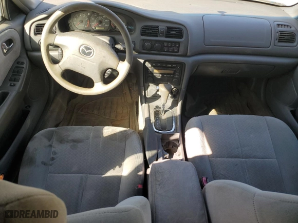 2001 Mazda 626 LX with VIN 1YVGF22C815240640, listed as a Copart auction lot 47609315 with 0 mi miles and Salvage Title. Bid and sale history available at carsss.com. Image 8.