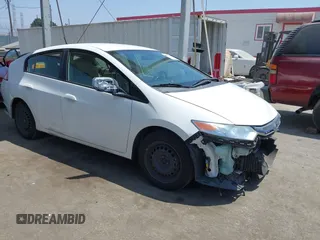 2014 Honda Insight LX with VIN JHMZE2H51ES001317, listed as a IAAI auction lot 42587972 with 191,780 mi miles and . Bid and sale history available at DreamBid. Image 1.