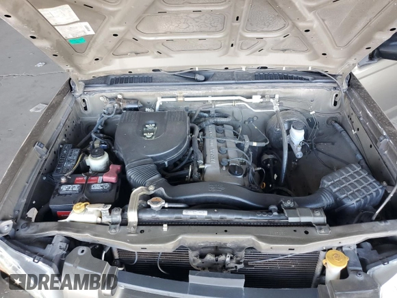 2002 Nissan Frontier XE z VIN 1N6DD26S52C378601, wystawiony jako Copart lot #56782295 z przebiegiem 147 729 mil mil oraz Szkoda całkowita • Salvage title. Historia ofert i sprzedaży dostępna na DreamBid. Obrazek 11.