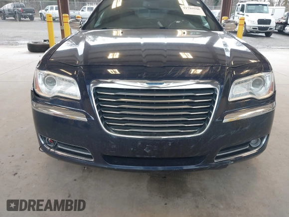 2013 Chrysler 300 with VIN 2C3CCAET7DH673242, listed as a IAAI auction lot 41785948 with 135,968 mi miles. Bid and sale history available at carsss.com. Image 6.