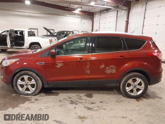 2015 Ford Escape SE with VIN 1FMCU0GX3FUB12115, listed as a IAAI auction lot 41282103 with 191,231 mi miles and . Bid and sale history available at DreamBid. Image 14.