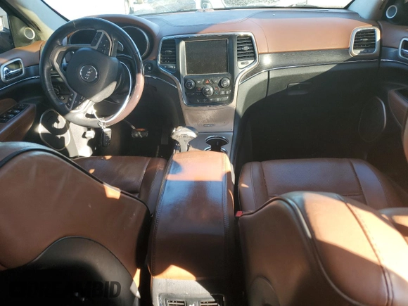 2015 Jeep Grand Cherokee Summit with VIN 1C4RJFJG0FC700014, listed as a Copart auction lot 42981765 with 144,937 mi miles and Salvage Title. Bid and sale history available at DreamBid. Image 8.