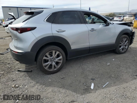 2021 Mazda CX-30 Select with VIN 3MVDMABLXMM256327, listed as a Copart auction lot 51185235 with 76,630 mi miles and Salvage Title. Bid and sale history available at DreamBid. Image 3.