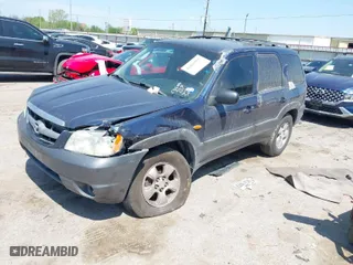 2003 Mazda Tribute LX with VIN 4F2CZ04133KM23234, listed as a IAAI auction lot 41869955 with 240,898 mi miles. Bid and sale history available at carsss.com. Image 2.