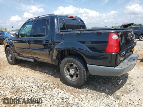 2005 Ford Explorer Sport Trac XLS with VIN 1FMZU67K65UA29830, listed as a Copart auction lot 54941185 with 214,220 mi miles and Salvage title. Bid and sale history available at DreamBid. Image 2.