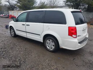 2012 Dodge Grand Caravan SE with VIN 2C4RDGBG6CR399702, listed as a IAAI auction lot 41458861 with 172,349 mi miles. Bid and sale history available at carsss.com. Image 3.