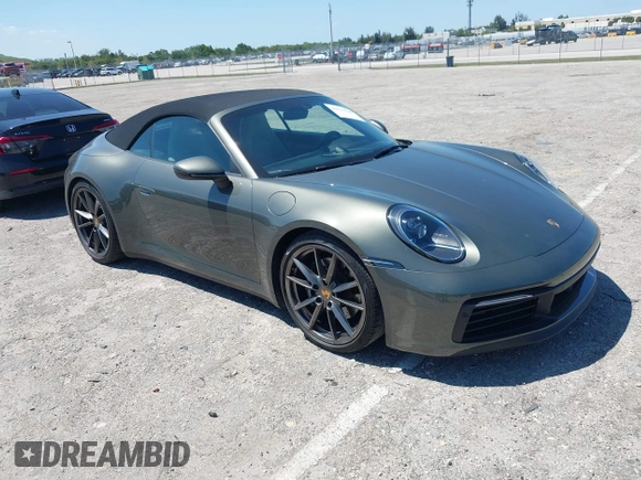 2020 Porsche 911 Carrera S with VIN WP0CB2A97LS263238, listed as a IAAI auction lot 42021346 with 23,899 mi miles. Bid and sale history available at carsss.com. Image 1.