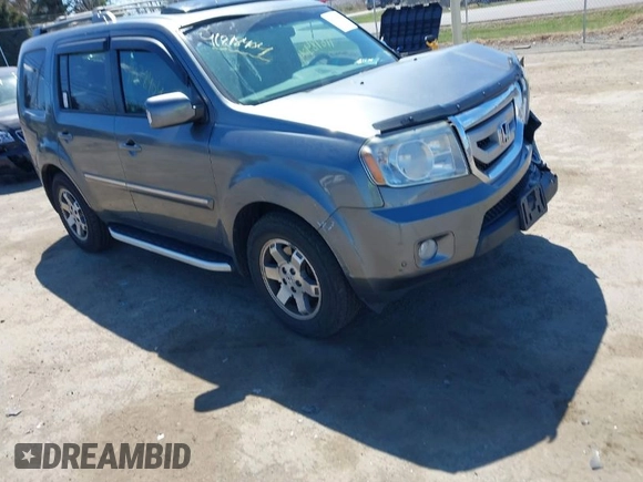 2011 Honda Pilot Touring with VIN 5FNYF4H95BB090892, listed as a IAAI auction lot 41878404 with 131,757 mi miles. Bid and sale history available at carsss.com. Image 1.