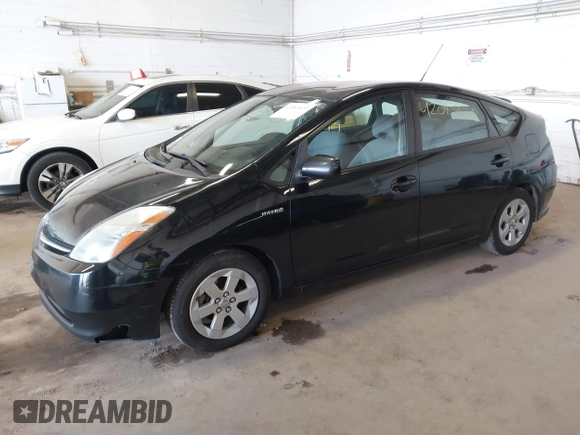 2008 Toyota Prius with VIN JTDKB20U983317853, listed as a IAAI auction lot 42083539 with 225,877 mi miles. Bid and sale history available at carsss.com. Image 2.