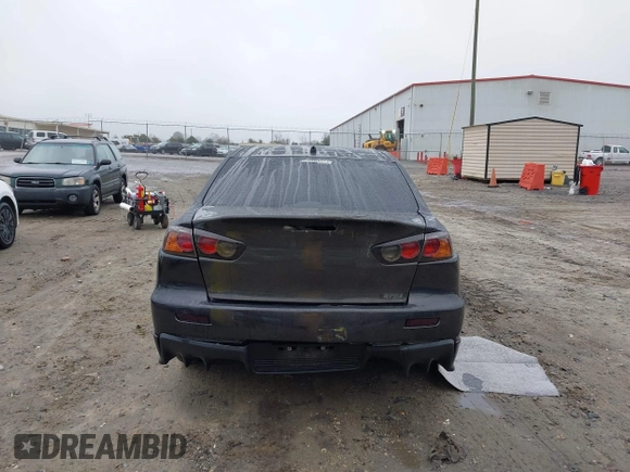 2010 Mitsubishi Lancer Evolution GSR with VIN JA32W8FV1AU012725, listed as a IAAI auction lot 41542629 with 124,347 mi miles and . Bid and sale history available at DreamBid. Image 16.