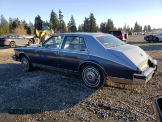 1984 Cadillac Seville z VIN 1G6AS6987EE810927, wystawiony jako Copart lot #42836105 z przebiegiem 19 894 mil mil oraz Tytuł czysty. Historia ofert i sprzedaży dostępna na DreamBid. Obrazek 2.