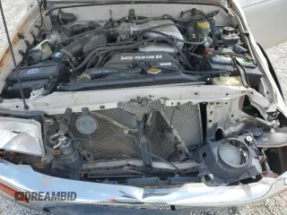 1997 Toyota 4Runner SR5 z VIN JT3HN86R4V0073022, wystawiony jako Copart lot #57112245 z przebiegiem 220 732 mil mil oraz Szkoda całkowita • Salvage title. Historia ofert i sprzedaży dostępna na DreamBid. Obrazek 12.