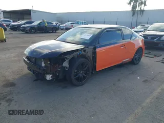 2015 Scion tC with VIN JTKJF5C79FJ008795, listed as a IAAI auction lot 41570815 with 88,809 mi miles. Bid and sale history available at carsss.com. Image 18.