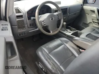 2006 Nissan Titan SE с VIN 1N6BA06A16N571799, выставлен на аукционе Copart как лот 46093745 с пробегом 118 019 миль миль и Списание • Salvage title. История ставок и продаж доступна на DreamBid. Изображение 8.