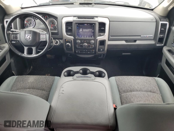 2018 Ram 1500 Lone Star Silver with VIN 1C6RR6LT6JS266013, listed as a Copart auction lot 56895915 with 136,453 mi miles and Salvage title. Bid and sale history available at DreamBid. Image 8.