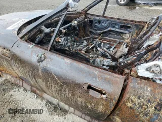 1997 BMW 3 Series Z3 2.8 z VIN 4USCJ3320VLC02817, wystawiony jako Copart lot #69536054 z przebiegiem Nie podano mil oraz Nie do naprawy • Non repairable. Historia ofert i sprzedaży dostępna na DreamBid. Obrazek 7.