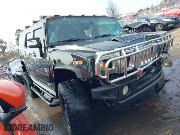 2006 Hummer H2 with VIN 5GRGN23U06H113353, listed as a IAAI auction lot 41476649 with 165,370 mi miles. Bid and sale history available at carsss.com. Image 1.