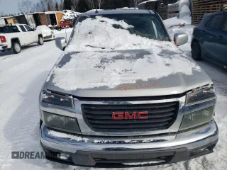 2011 GMC Canyon SLT with VIN 1GTH6NFE2B8117617, listed as a Copart auction lot 43222695 with 146,277 mi miles and Salvage Title. Bid and sale history available at carsss.com. Image 5.