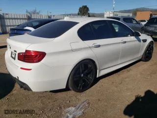 2015 BMW M5 with VIN WBSFV9C51FD594308, listed as a Copart auction lot 43259104 with 73,158 mi miles. Bid and sale history available at carsss.com. Image 3.