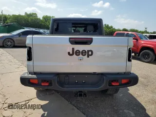 2022 Jeep Gladiator Rubicon z VIN 1C6JJTBG6NL104521, wystawiony jako Copart lot #57325365 z przebiegiem 31 498 mil mil oraz Szkoda całkowita • Salvage title. Historia ofert i sprzedaży dostępna na DreamBid. Obrazek 6.