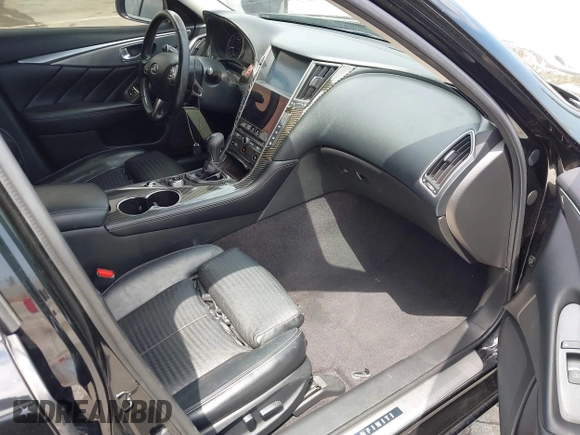 2014 Infiniti Q50 Premium z VIN JN1BV7AP3EM690571, wystawiony jako IAAI lot #42136354 z przebiegiem 191 969 mil mil oraz . Historia ofert i sprzedaży dostępna na DreamBid. Obrazek 5.