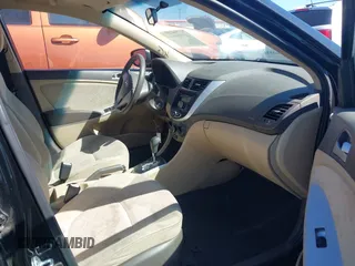 2012 Hyundai Accent GLS with VIN KMHCT4AE3CU265199, listed as a IAAI auction lot 41826958 with 121,618 mi miles. Bid and sale history available at carsss.com. Image 5.