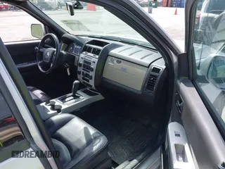 2008 Mercury Mariner Premier with VIN 4M2CU97198KJ12620, listed as a IAAI auction lot 41909389 with 131,884 mi miles and . Bid and sale history available at DreamBid. Image 5.