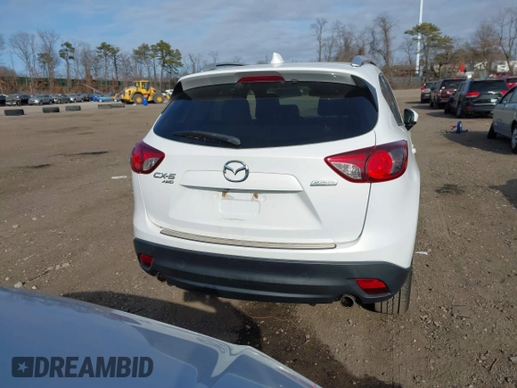 2014 Mazda CX-5 Grand Touring with VIN JM3KE4DY7E0425201, listed as a IAAI auction lot 41803597 with 118,867 mi miles. Bid and sale history available at carsss.com. Image 17.