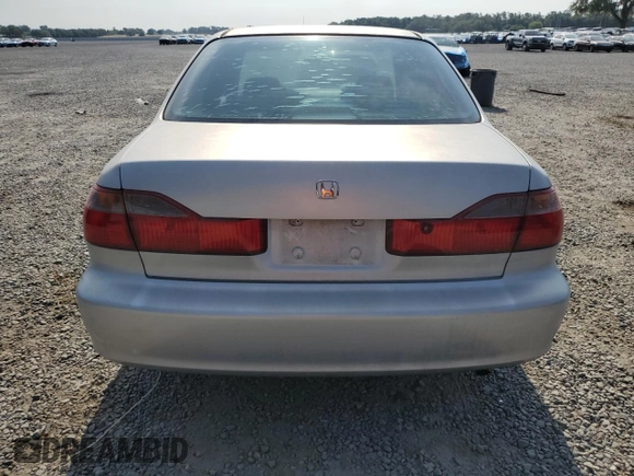 1999 Honda Accord LX z VIN 1HGCG5647XA024074, wystawiony jako Copart lot #56057575 z przebiegiem Nie podano mil oraz Szkoda całkowita • Salvage title. Historia ofert i sprzedaży dostępna na DreamBid. Obrazek 6.
