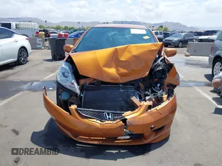 2009 Honda Fit Sport z VIN JHMGE88459S053122, wystawiony jako IAAI lot #42195267 z przebiegiem 47 349 mil mil oraz . Historia ofert i sprzedaży dostępna na DreamBid. Obrazek 12.